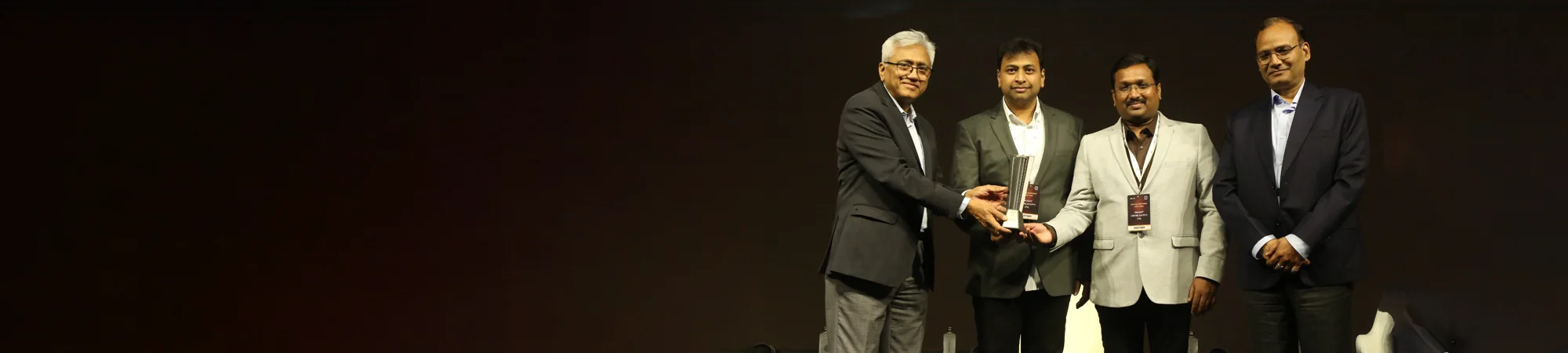 JSL Samagam 2026 annual partners meet award ceremony on stage with business leaders